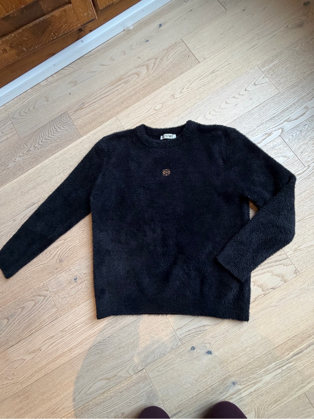 Loewe Black Fuzzy Crewneck Sweater with Gold  Metal Emblem.